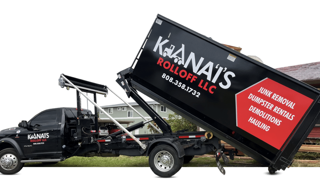 A black Kanai's Rolloff LLC truck unloads a large dumpster labeled for junk removal, dumpster rentals, demolitions, and hauling near residential homes.